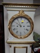 A continental painted longcase clock with pendulum and two weights