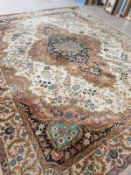 A large Tabriz design carpet,