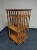 An Edwardian oak revolving bookcase