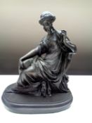 A composition figure depicting a lady seated holding a necklace