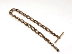 A 9ct gold chain with 15ct gold T-bar, weight 60.