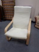 A beech framed Ikea relaxer chair
