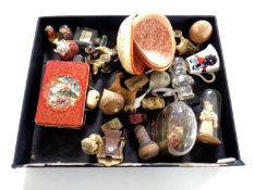 An interesting collection of collectibles to include sewing accessories, small dog figure,