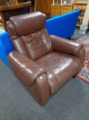 A brown leather armchair