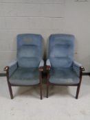 A pair of 20th century beech framed armchairs in blue upholstery