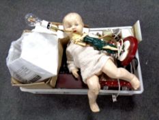 A box containing table lamp bases, vintage doll,