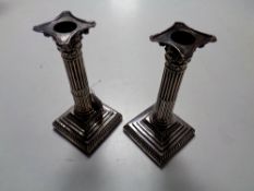 A pair of late Victorian Corinthian column silver candlesticks, Sheffield 1897,