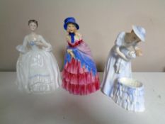 A Royal Doulton figure, Victorian Lady, together with two further figures, HN3235 Mother and Baby,