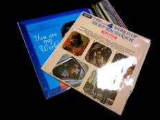 A box containing a quantity of LP records including Frank Sinatra,