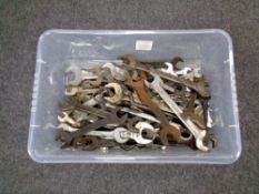 A plastic crate containing a quantity of spanners