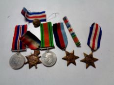 A group of First and Second World War medals including a 1914-15 Star awarded to R-10854 PTE T. A.