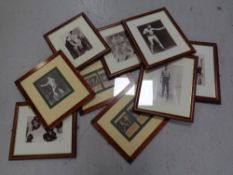 A group of approximately ten framed boxing prints