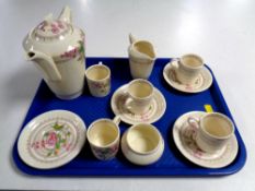 A thirteen-piece Crown Ducal Wild Rose coffee service.