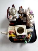 A tray containing four novelty teapots,