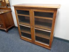 A 19th century mahogany double door glazed bookcase.