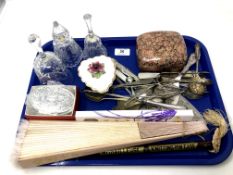 A tray containing hand fans, plated cutlery, glass bells, trinket box etc.