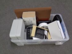 A box of miscellany to include Omron blood pressure monitor, cash box, alarm clocks etc.