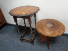 An Edwardian oak barley twist occasional table together with a carved eastern wine table