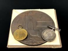 A First World War medal pair and death plaque, awarded to 175405 Gnr. R. W. Cowen R.A.