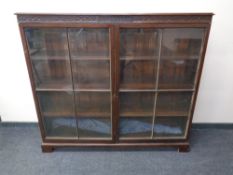 A 19th century mahogany glazed double door bookcase.