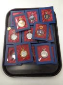A tray of twelve The Pocket Watch Collection watches, boxed.
