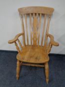 A pine farmhouse armchair