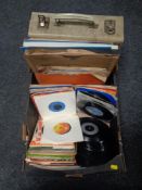 A box containing vinyl LP's, 78's and 7