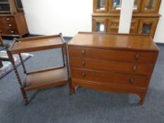 A twentieth century oak three drawer chest together with an oak barley twist trolley