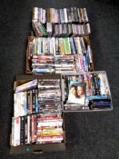 Four boxes of various CD's and DVD's.