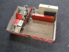 A box of cased cutlery, plated ware, playing cards etc.