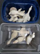Two boxes of a large quantity of duck ornaments.