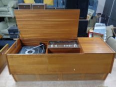 A teak cased HMV solid state stereogram.
