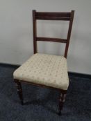 An Edwardian oak dining chair