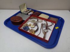 A tray of boxed Ronson lighters, Routemaster trinket box, plated cigarette case, costume jewellery,