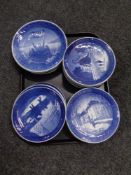 A tray of twenty-three Royal Copenhagen commemorative plates.