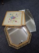 Two framed needlework panels together with a gilt framed octagonal mirror and a frameless bevelled