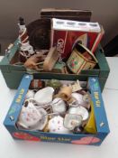 An Edwardian monochrome photograph of a baby together with two boxes of various items including