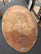 A large oval wool carpet,