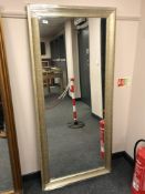 A rectangular silvered effect mirror,