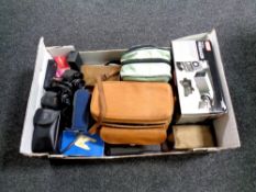 A box containing a large quantity of vintage and later cameras, camera accessories,