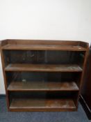 A set of 20th century oak sliding glass door bookshelves