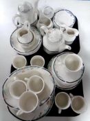 A tray containing an extensive Royal Doulton Juno tea and dinner service