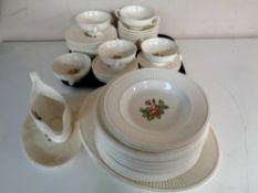 A fifty-five piece Wedgwood Moss Rose dinner service