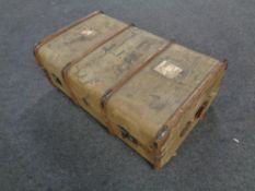 An early 20th century canvas Bentwood shipping trunk