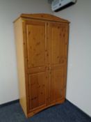 A pine double door wardrobe