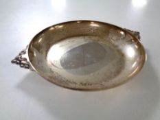 A silver twin handled dish, Sheffield marks, 474g.