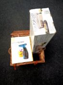 A Fortnum and Mason wicker hamper containing a stainless steel fish poacher,