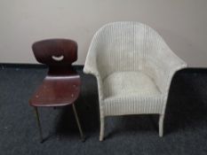 A painted loom armchair together with a stained beech chair on metal legs