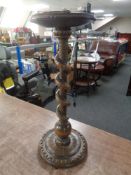 A carved beech serpent smoker's stand with copper ashtray