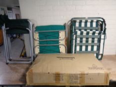 A boxed Deluxe garden hammock together with four assorted folding garden chairs and loungers